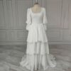 ai-edited-1776599940812-5 Vintage Broderie Anglaise Wedding Dress with Tiered Eyelet Lace Skirt