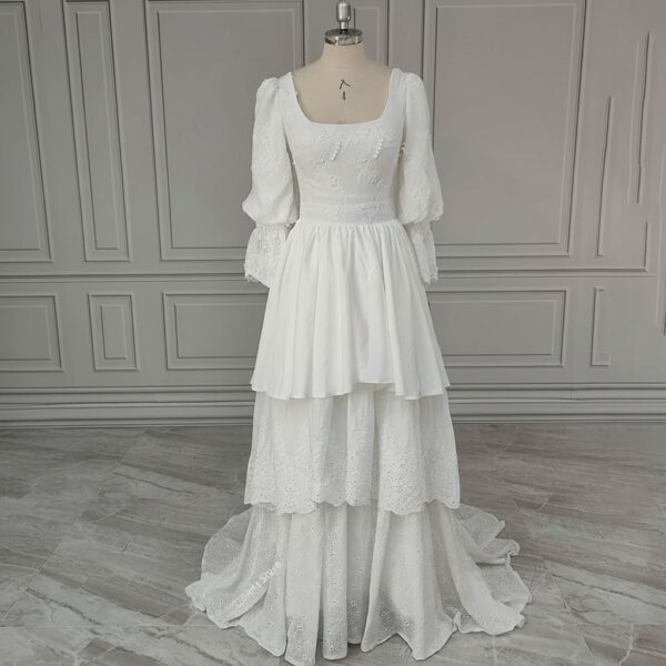 ai-edited-1776599940812-5 Vintage Broderie Anglaise Wedding Dress with Tiered Eyelet Lace Skirt