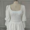 ai-edited-1776599942170-6 Vintage Broderie Anglaise Wedding Dress with Tiered Eyelet Lace Skirt