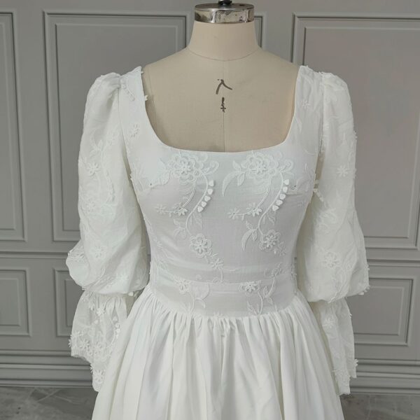 ai-edited-1776599942170-6 Vintage Broderie Anglaise Wedding Dress with Tiered Eyelet Lace Skirt