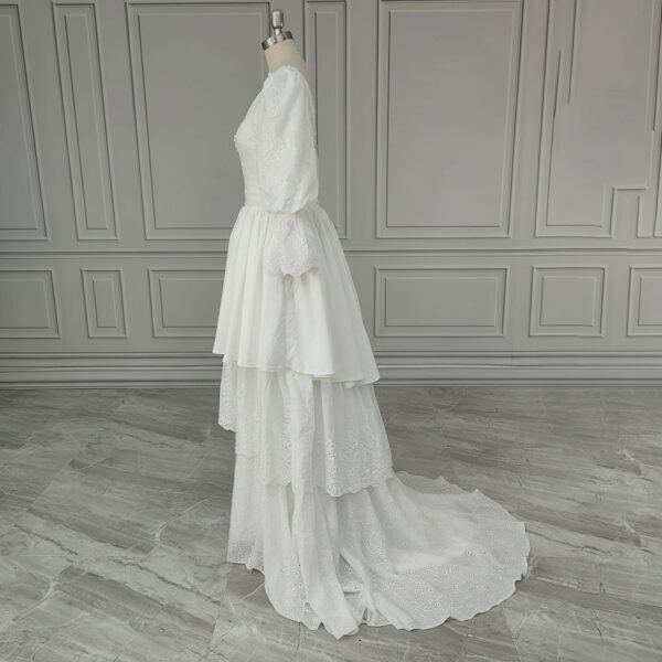 ai-edited-1776599947760-11 Vintage Broderie Anglaise Wedding Dress with Tiered Eyelet Lace Skirt