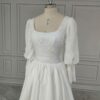 ai-edited-1776599949002-12 Vintage Broderie Anglaise Wedding Dress with Tiered Eyelet Lace Skirt