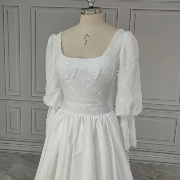 ai-edited-1776599949002-12 Vintage Broderie Anglaise Wedding Dress with Tiered Eyelet Lace Skirt