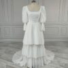 ai-edited-1776599950124-13 Vintage Broderie Anglaise Wedding Dress with Tiered Eyelet Lace Skirt
