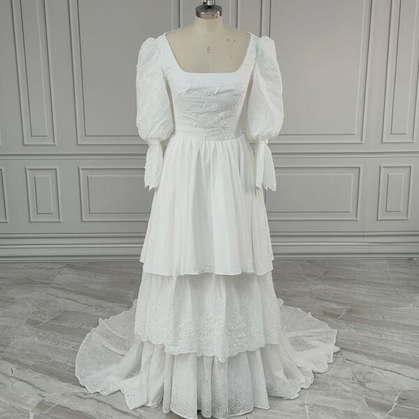 ai-edited-1776599950124-13 Vintage Broderie Anglaise Wedding Dress with Tiered Eyelet Lace Skirt