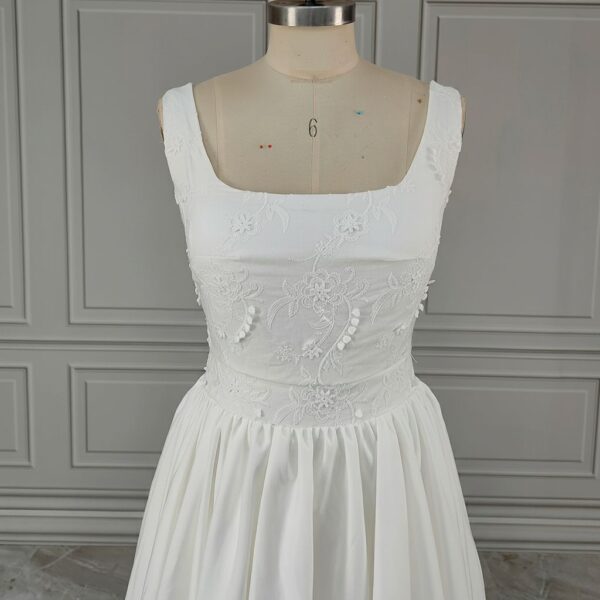 ai-edited-1776599954551-17 Vintage Broderie Anglaise Wedding Dress with Tiered Eyelet Lace Skirt