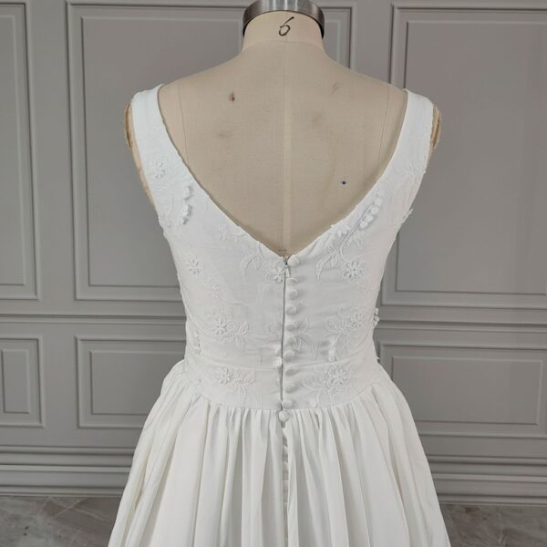 ai-edited-1776599956757-19 Vintage Broderie Anglaise Wedding Dress with Tiered Eyelet Lace Skirt
