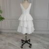 ai-edited-1776599960351-22 Vintage Broderie Anglaise Wedding Dress with Tiered Eyelet Lace Skirt