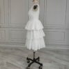 ai-edited-1776599962707-24 Vintage Broderie Anglaise Wedding Dress with Tiered Eyelet Lace Skirt