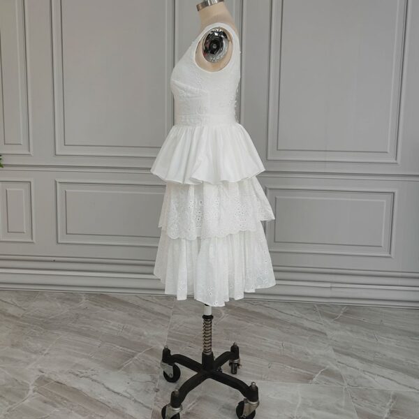 ai-edited-1776599962707-24 Vintage Broderie Anglaise Wedding Dress with Tiered Eyelet Lace Skirt