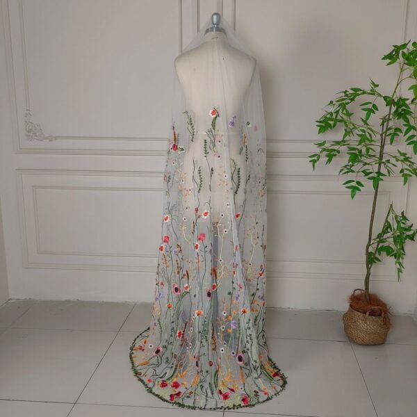 Floral Embroidered Tulle Cape The Honeyblossom Veil, a wildflower wedding veil embroidered all over with poppies, daisies and ferns