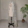 Floral Embroidered Tulle Veil The Honeyblossom Veil, a wildflower wedding veil embroidered all over with poppies, daisies and ferns