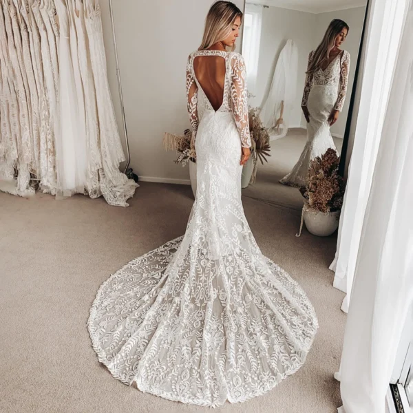 S42a81ec0c4df4a258cb2ff5ac5f1eaa3P.webp Ever After Elegance Boho Wedding Dress