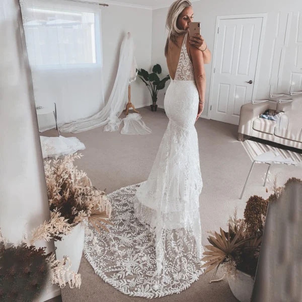 S76d39a8b67294d27ab8ffd27cc966f55Z.webp Ever After Elegance Boho Wedding Dress
