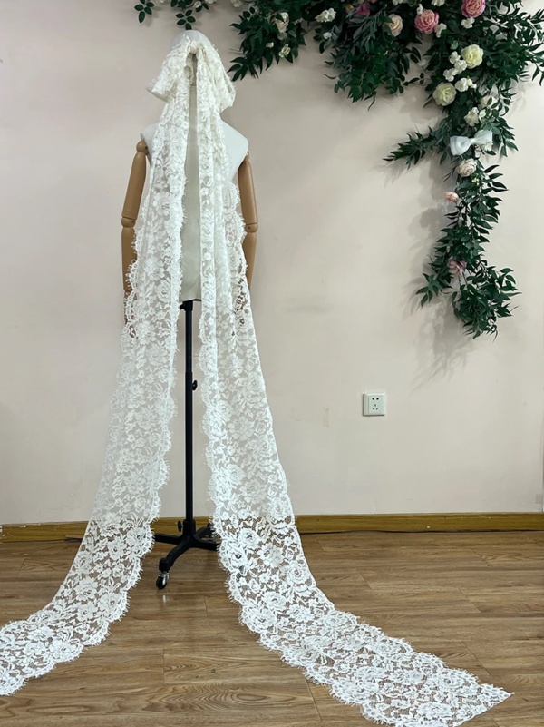 Sa3e0c8649913443aa003d76ca2f1eb02j-webp Timeless Elegance Long Lace Bow Bridal Veil