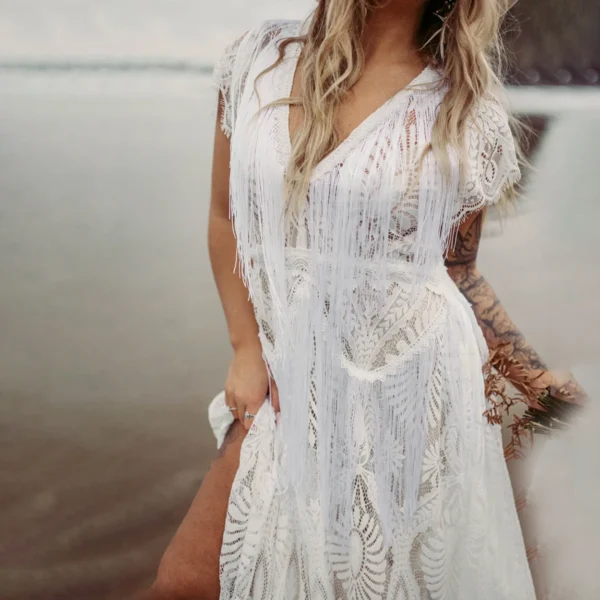 Sa4b5fe5b2eff4bbea11ecd6bb7cbd3b1T.webp Desert Moon Fringe Wedding Dress