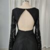Close view of keyhole back on black lace wedding dress