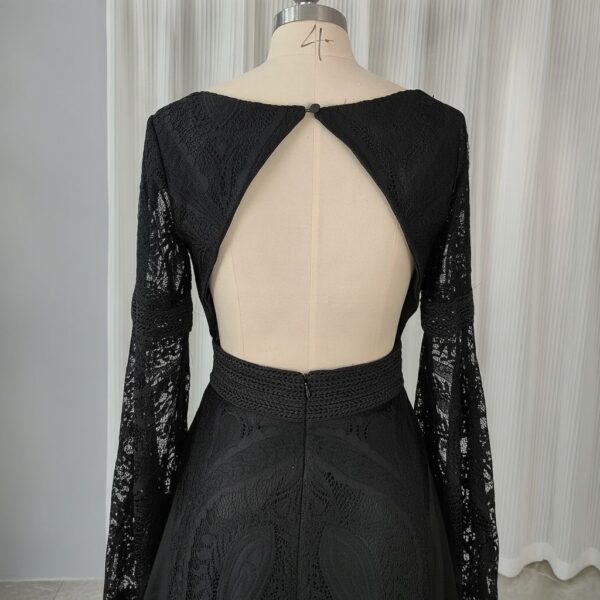 Close view of keyhole back on black lace wedding dress