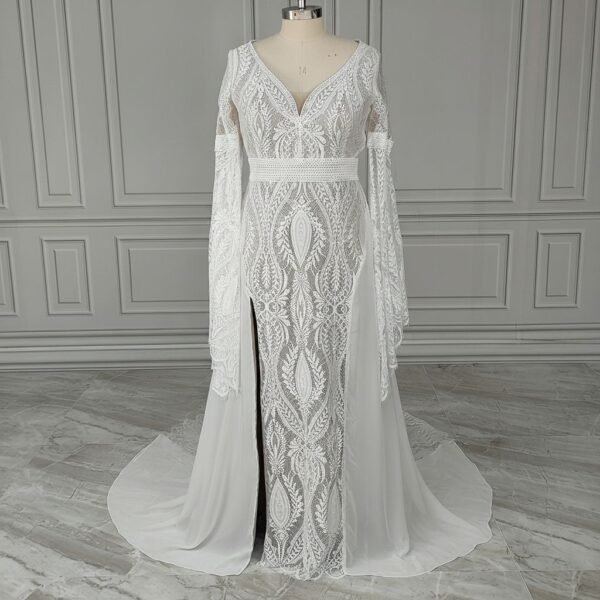 Full-length off-white bohemian lace wedding dress in studio