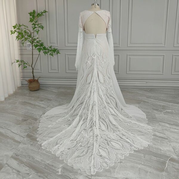 Rear studio view of boho lace wedding gown with scalloped train