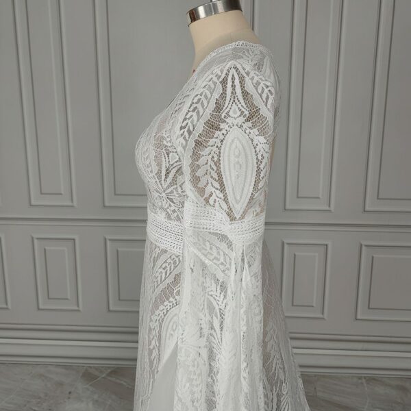 Side view showing intricate lace sleeve and fitted bridal bodice