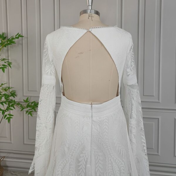 Rear bodice detail of off-white keyhole-back wedding dress