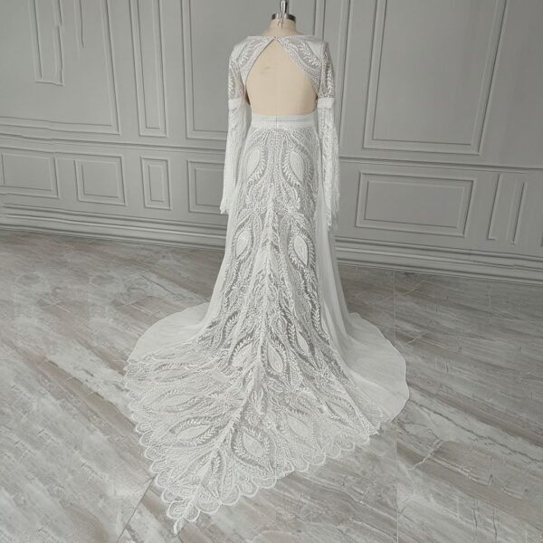 Back view of off-white patterned lace wedding dress and train