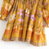 H3b05ce991ac94349893e2fa68400ca8bA Floral Whimsy Ruffles Boho Mini Dress