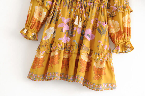 H3b05ce991ac94349893e2fa68400ca8bA Floral Whimsy Ruffles Boho Mini Dress