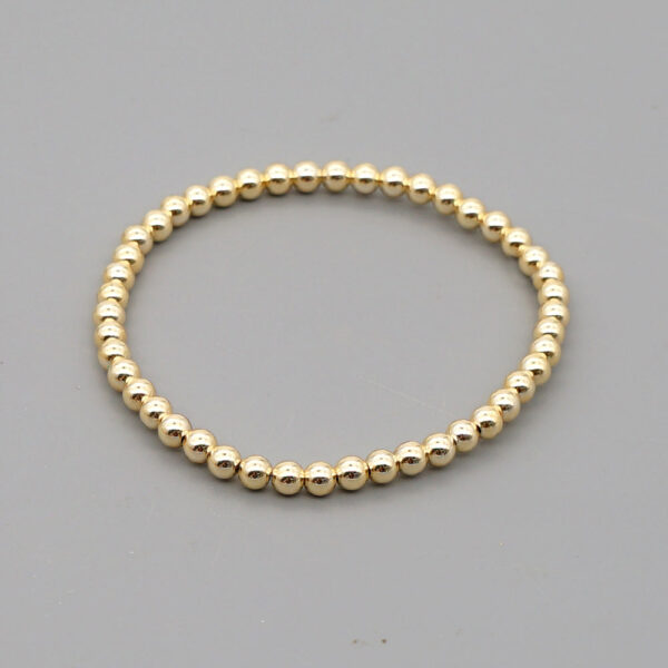 H6ef426f415f241fcb6b72403f16c4ed8h_f7d8a537-9713-435e-af45-31f0bfd3bc33 Dream Weaver Boho Bracelet
