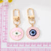 S07a86a0aeb604b70825b290eaebed94cV Spirit and Rebel Evil Eye Keychain