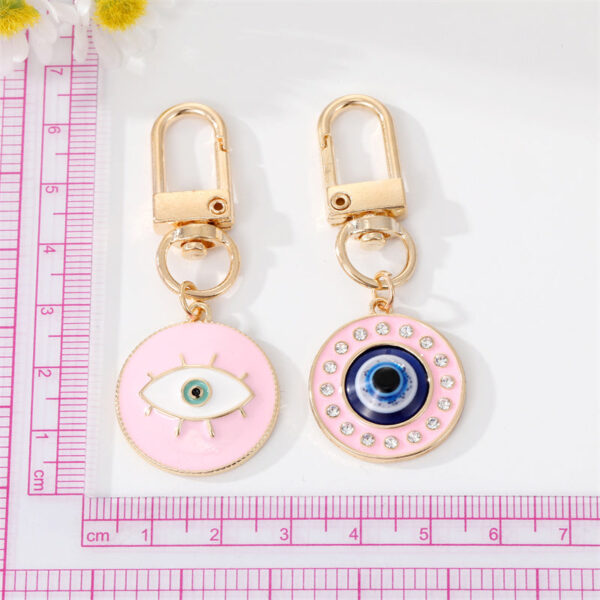 S07a86a0aeb604b70825b290eaebed94cV Spirit and Rebel Evil Eye Keychain
