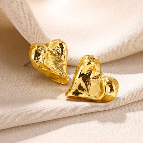 Sa49a2414705c48109b95a2a37d0ff7cfA Boho Bow Gold Color Earrings – Spirit & Rebel