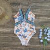 Sfc5e1a287f054e4f8907c94ddf3c3c378 Wanderlust One-Piece Swimsuit
